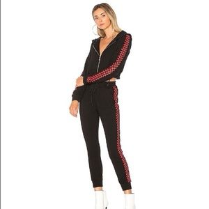 Danielle Guizio ‘Godspeed’ checkered track suit